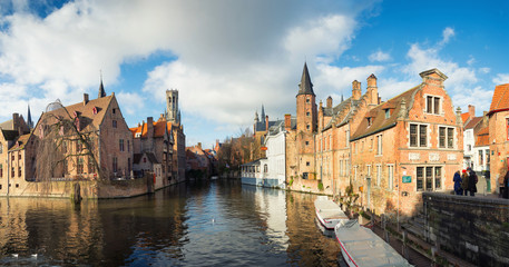 Fototapeta premium January Bruges. Panoramic views of the city and Belfort, with seagulls and beautiful sky