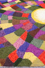 Multicolored floral carpet made with flower petals