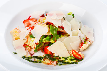 Restaurant food closeup - unusual salad with bacon and strawberr