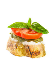 Bruschetta with pesto and cheese.
