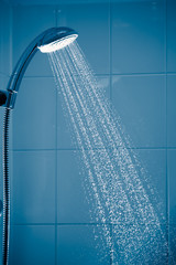 Naklejka na ściany i meble contrast shower with flowing water