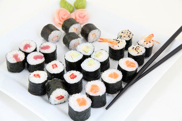 sushi set on white plate. Traditional japanese sushi rolls