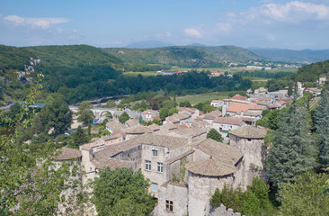 Fototapeta na wymiar The medieval town of Vogue over the River Ardeche in France.
