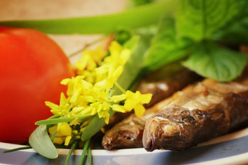 smoked capelin fish with garnish
