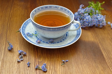 vintage tea cup with forget me nots