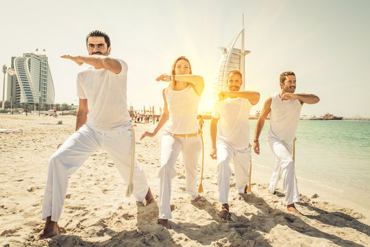 capoeira team on the beach