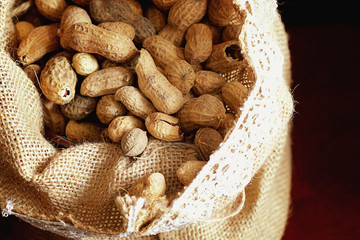 Peanut in a peel and shelled