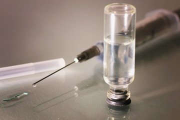syringe and ampoule
