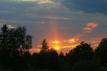 Pink sunset in the village