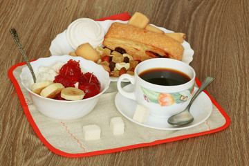 Breakfast with coffee and cream dessert