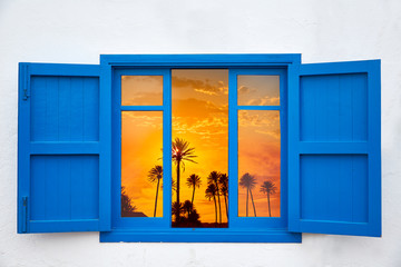 Almeria from window Cabo de Gata palm sunset