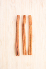 Cinnamon sticks on wooden table