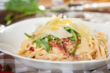 Italian pasta with sauce and parmesan cheese