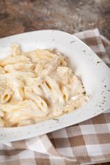 Penne with parmesan cheese sauce