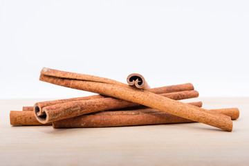 Cinnamon sticks on wooden table