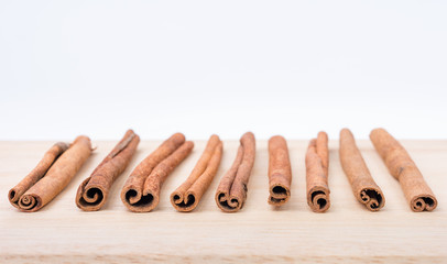 Cinnamon sticks on wooden table