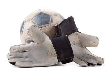 Soccer goalkeeper's gloves and the ball
