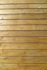 Laminated board wall of a modern wood house under construction
