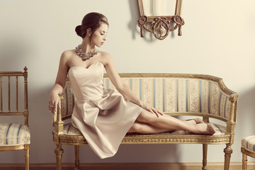 aristocratic girl on sofa