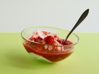joghurt with strawberry pulp as dessert