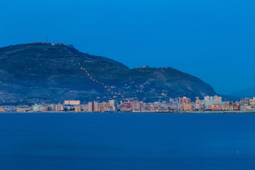 View on Trapani city center and cable-car to Erice at dawn