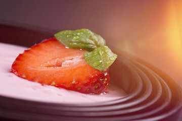 quark with strawberry in a black asian bowl