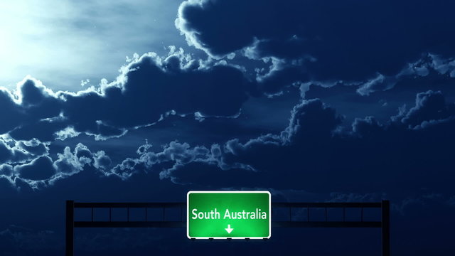 Passing under South Australia Highway Road Sign at Night
  