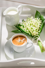 Delicious coffee with flowers