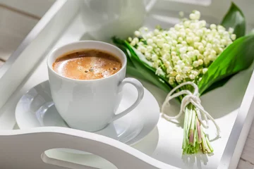 Foto auf Alu-Dibond Delicious coffee with lilies of the valley © shaiith
