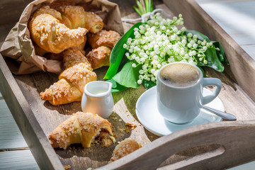 Spring breakfast with coffee and croissant