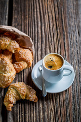 Delicious coffee and croissant for breakfast