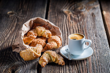 Delicious fresh croissant and coffee for breakfast