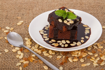 Delicious chocolate cake on white plate
