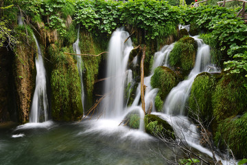 woman near  waterfalls