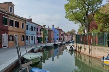 Fototapeta na wymiar Burano waterstreet - canale with boats, Burano, Italy