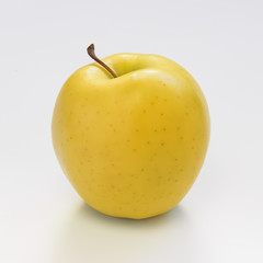 Yellow gold pple on white background