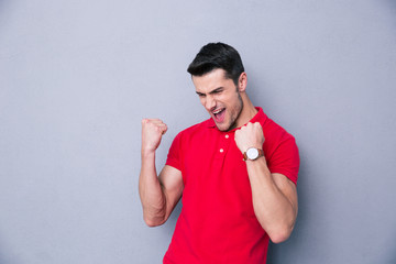 Casual man celebrating success