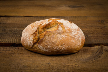 white bread over wooden background