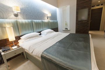 Interior of a luxury double bed hotel bedroom