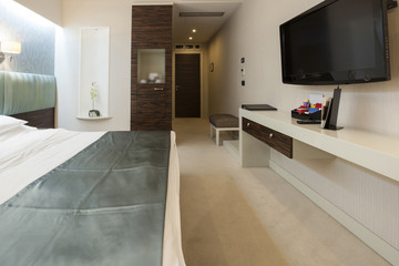 Interior of a luxury double bed hotel bedroom