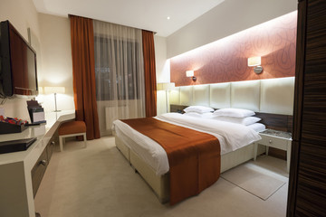 Interior of a luxury double bed hotel bedroom