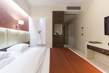 Interior of a luxury double bed hotel bedroom