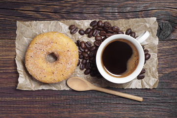 Coffee cup and donut