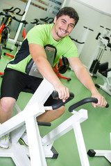 man practicing exercise in the gym