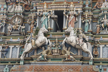 Fototapeta premium Detail of the Sri Mahamariamman Hindu temple with figures and horses - Kuala Lumpur, Malaysia