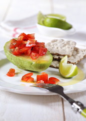 Avocado stuffed tomatoes