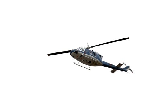Italian police helicopter flying over the city