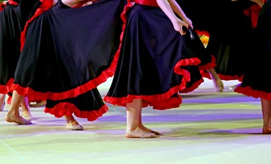 legs of the dancers during the performance of flamenco dancing i
