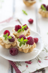 Sweet tartalette with fresh raspberries