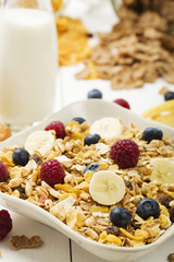 Light, delicious breakfast with cereal and fruit.